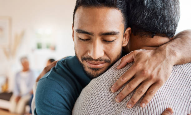 A man embracing a loved one