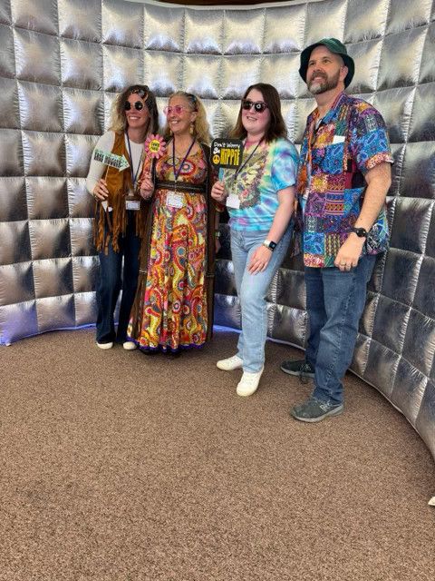 STEL staff and friends at the Spring Fling photo booth