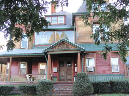 A red Victorian SRO home